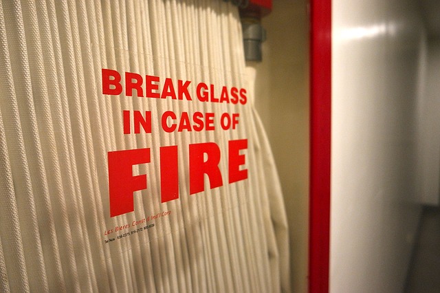 fire hose inside glass case for office fire safety