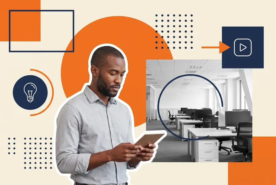 Learning and development manager reviewing a tablet in an open-plan office